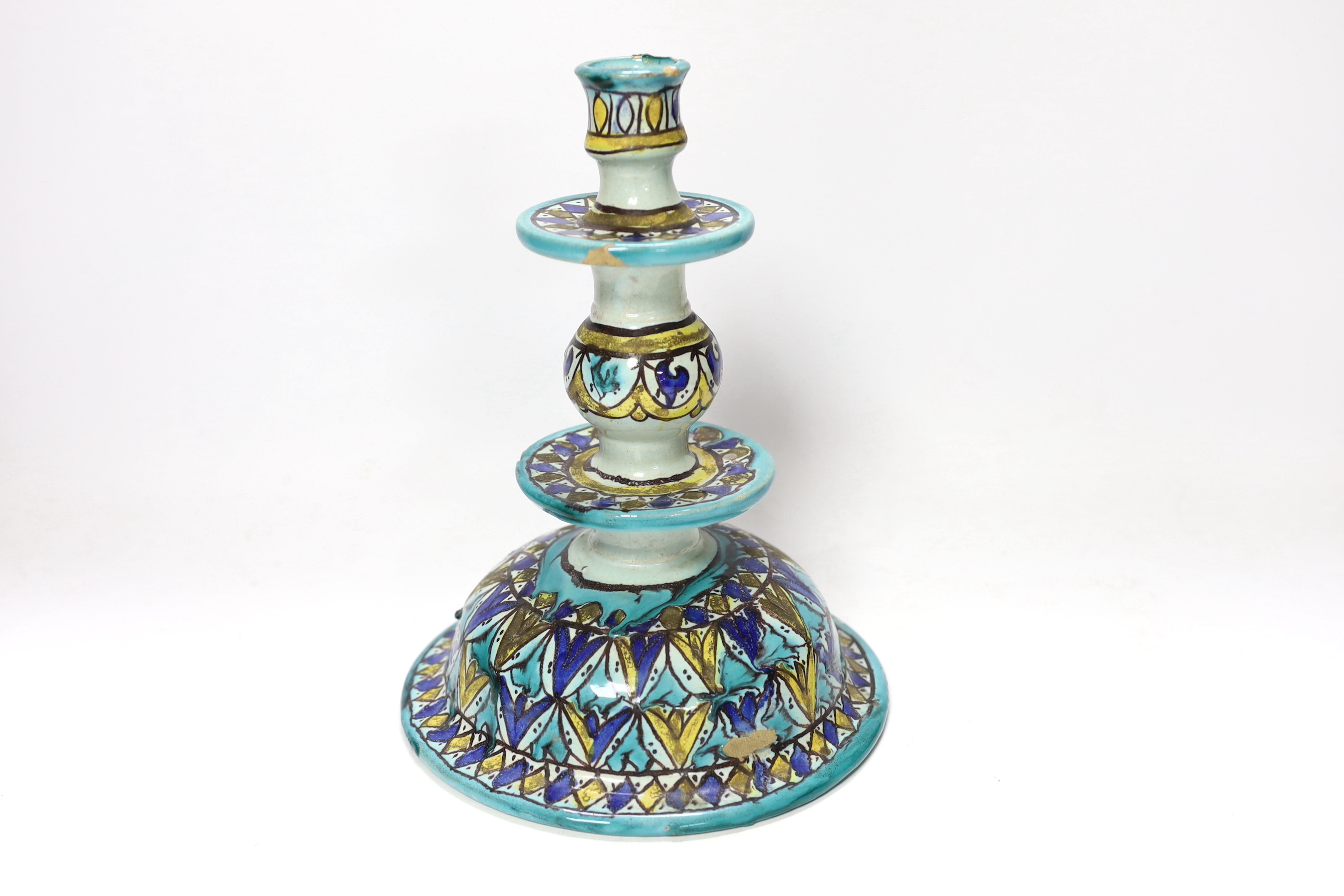 A Moroccan pottery candlestick, 24cm